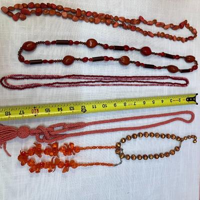 Sale Photo Thumbnail #285: Set of 7 pink/red/coral colored beaded necklaces, costume jewelry