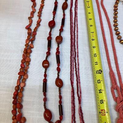 Sale Photo Thumbnail #286: Set of 7 pink/red/coral colored beaded necklaces, costume jewelry