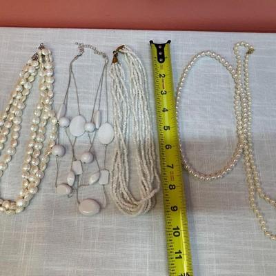 Sale Photo Thumbnail #291: Set of 5 white/cream colored beaded necklaces, costume jewelry