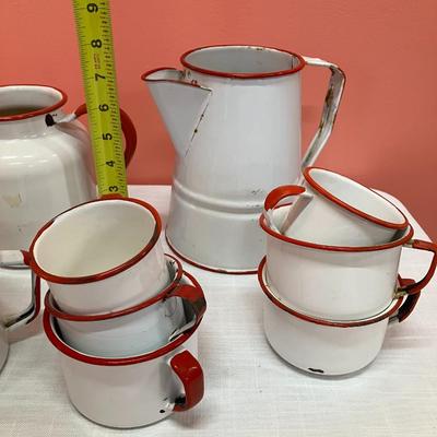 Sale Photo Thumbnail #308: Set of 15 pieces of red/white enamel dishes including 12 cups of various sizes and 3 pots/pitcher