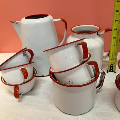 Sale Photo Thumbnail #309: Set of 15 pieces of red/white enamel dishes including 12 cups of various sizes and 3 pots/pitcher