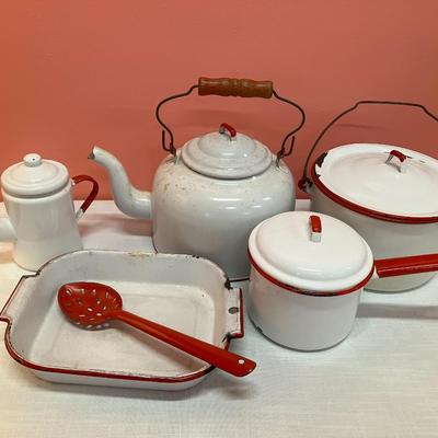 Sale Photo Thumbnail #310: 10 piece set of red/white enamel dishes including a baking dishes, slotted spoon, coffee pot, tea kettle, stock pot and other pot with lids