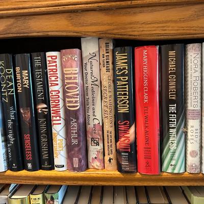 TWO SHELVES OF BOOKS
