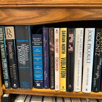 TWO SHELVES OF BOOKS