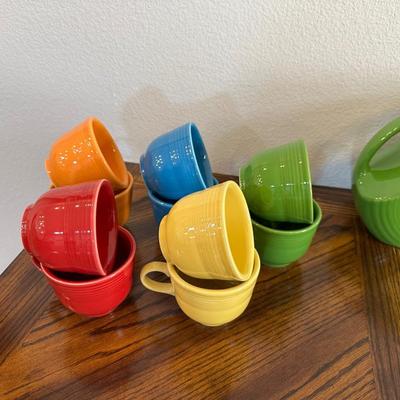 FIESTAWARE CUPS/SAUCERS, PITCHER, BOWLS AND PLATTERS