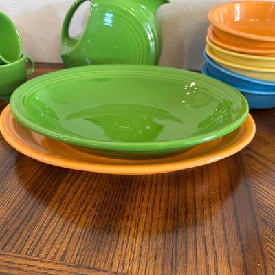 FIESTAWARE CUPS/SAUCERS, PITCHER, BOWLS AND PLATTERS