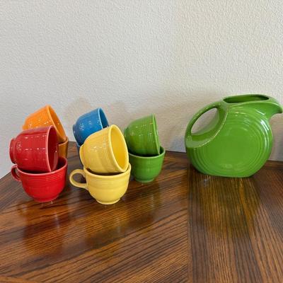 FIESTAWARE CUPS/SAUCERS, PITCHER, BOWLS AND PLATTERS
