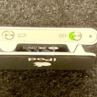Sale Photo Thumbnail #439: Apple iPod Shuffle Pair: 2nd Gen A1204 Silver 1GB With Dock and Apple iPod A1373 Shuffle 4th Generation 2GB Music MP3 Player Silver.  2nd Gen tested, recharged as expected using the dock. Unable to test the smaller 4th Gen player.  Both look to be in usea