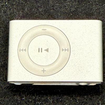 Sale Photo Thumbnail #437: Apple iPod Shuffle Pair: 2nd Gen A1204 Silver 1GB With Dock and Apple iPod A1373 Shuffle 4th Generation 2GB Music MP3 Player Silver.  2nd Gen tested, recharged as expected using the dock. Unable to test the smaller 4th Gen player.  Both look to be in usea
