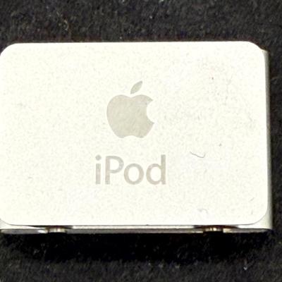 Sale Photo Thumbnail #438: Apple iPod Shuffle Pair: 2nd Gen A1204 Silver 1GB With Dock and Apple iPod A1373 Shuffle 4th Generation 2GB Music MP3 Player Silver.  2nd Gen tested, recharged as expected using the dock. Unable to test the smaller 4th Gen player.  Both look to be in usea