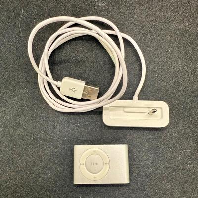 Sale Photo Thumbnail #436: Apple iPod Shuffle Pair: 2nd Gen A1204 Silver 1GB With Dock and Apple iPod A1373 Shuffle 4th Generation 2GB Music MP3 Player Silver.  2nd Gen tested, recharged as expected using the dock. Unable to test the smaller 4th Gen player.  Both look to be in usea