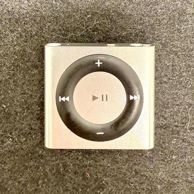 Sale Photo Thumbnail #441: Apple iPod Shuffle Pair: 2nd Gen A1204 Silver 1GB With Dock and Apple iPod A1373 Shuffle 4th Generation 2GB Music MP3 Player Silver.  2nd Gen tested, recharged as expected using the dock. Unable to test the smaller 4th Gen player.  Both look to be in usea