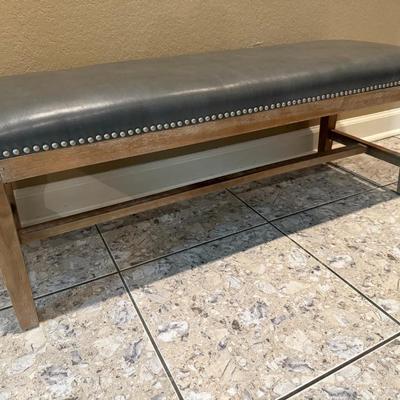 Sale Photo Thumbnail #202: Grey Faux Leather Bench with light brown wood legs