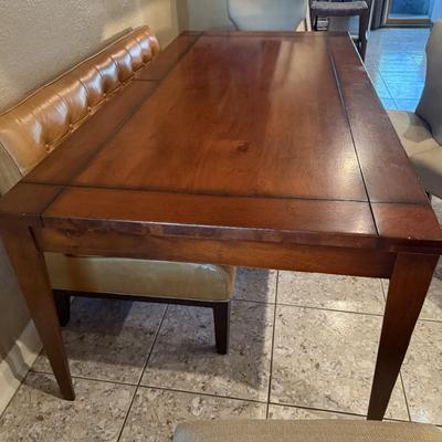 Sale Photo Thumbnail #207: Solid wood dining table, sits 6, heavy good quality steady. Modern design. Not extendable, Single piece top. Measures approximately 83"Lx41"W