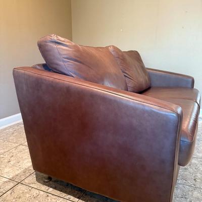 Sale Photo Thumbnail #224: Comfortable couch with a classic design. Chrome legs. 
Measures: 80"L x41"D x31"H (back part)/25"H (front arm )
