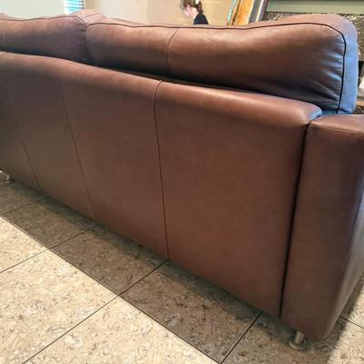 Sale Photo Thumbnail #226: Comfortable couch with a classic design. Chrome legs. 
Measures: 80"L x41"D x31"H (back part)/25"H (front arm )