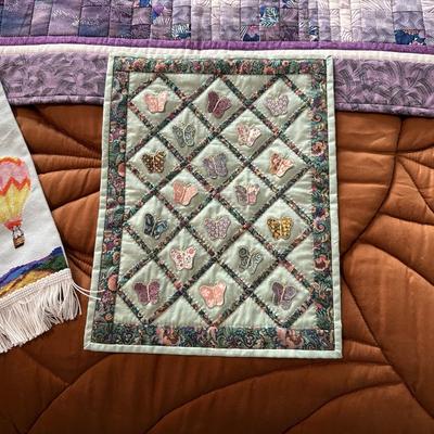 QUILTED WALL HANGINGS AND A CROSS STITCH