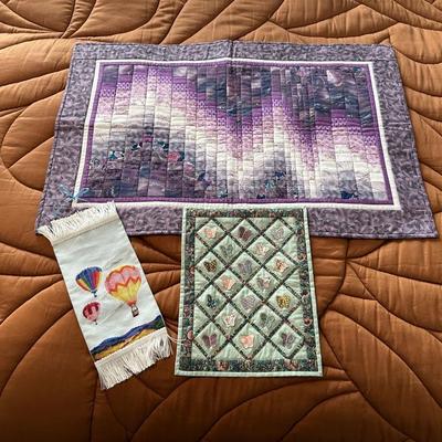 QUILTED WALL HANGINGS AND A CROSS STITCH