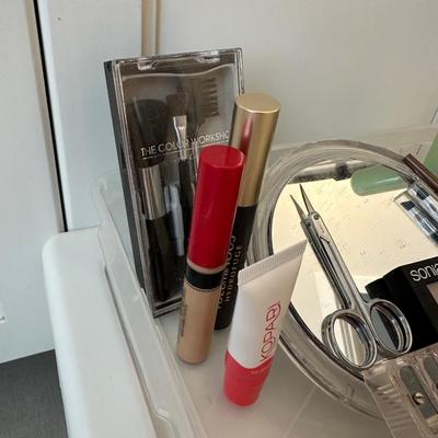 HAIR CARE WITH STORAGE BIN OF MAKEUP