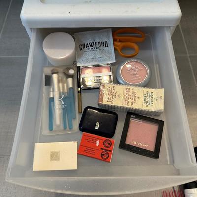 HAIR CARE WITH STORAGE BIN OF MAKEUP