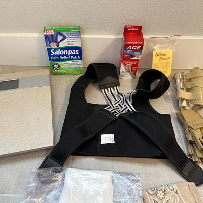 MISC BRACES WITH STORAGE BINS AND A BATH SCALE
