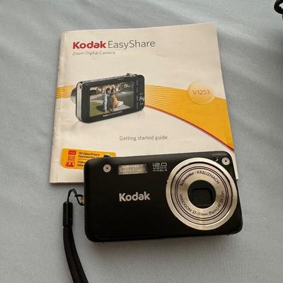 DIGITAL CAMERAS AND BINOCULARS