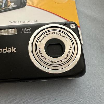 DIGITAL CAMERAS AND BINOCULARS