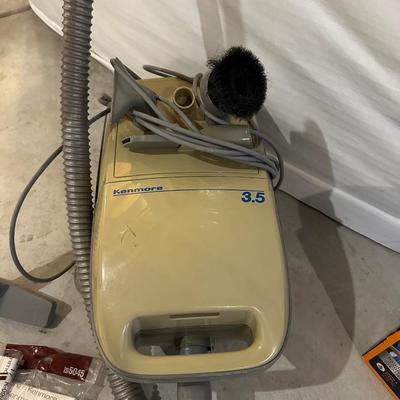 KENMORE CANISTER VACUUM AND CONAIR CLOTHES STEAMER