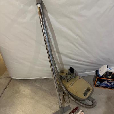 KENMORE CANISTER VACUUM AND CONAIR CLOTHES STEAMER