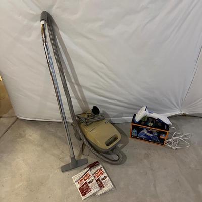 KENMORE CANISTER VACUUM AND CONAIR CLOTHES STEAMER