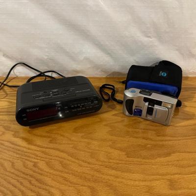 AM/FM ALARM CLOCK AND DIGITAL CAMERA