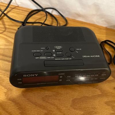 AM/FM ALARM CLOCK AND DIGITAL CAMERA