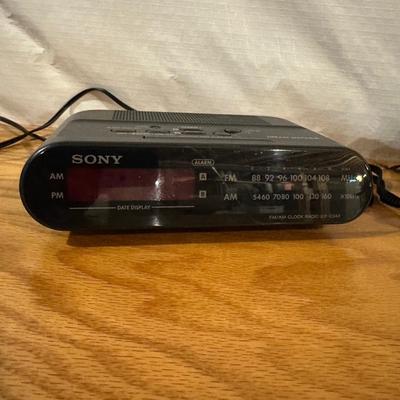 AM/FM ALARM CLOCK AND DIGITAL CAMERA