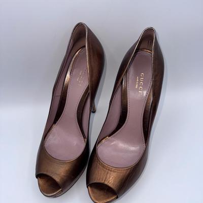 Gucci metallic bronze leather peep toe platform pumps