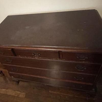 Sale Photo Thumbnail #20: The dresser measures approx. 43.5" x 21" 38.5". The dresser does show some ware and tare from age. Please see photos for more details.