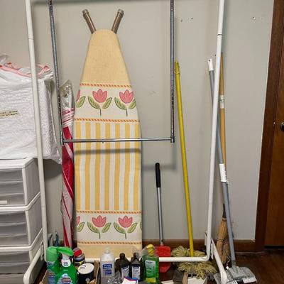 Sale Photo Thumbnail #106: Ironing board, cleaning supplies, toilet seat riser (in white bag), Kneeling pad, and more. Please see photos for more details.
