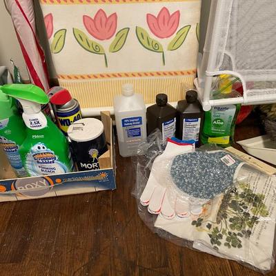 Sale Photo Thumbnail #104: Ironing board, cleaning supplies, toilet seat riser (in white bag), Kneeling pad, and more. Please see photos for more details.