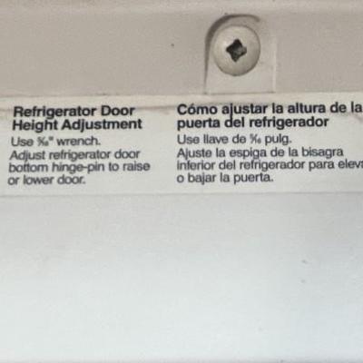 Sale Photo Thumbnail #233: The refrigerator features an indoor ice and water dispenser. The refrigerator has adjustible shelves, in door can caddies, and deli drawers and does work. Please see photos for more details.