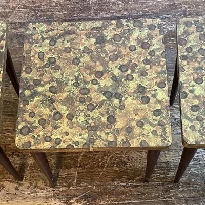 Sale Photo Thumbnail #296: The colors are green/brown/gold and has removable legs. The tables measure approx. 15" x 15" x 15" and has some scratching on the wood legs. Please see photos for more details.