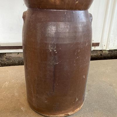 Sale Photo Thumbnail #370: With Lid. The Crock shows a lot of ware and tare from age and use. Measures approx. 17.5" Tall. Please see photos.