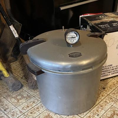 Sale Photo Thumbnail #386: Christmas decor, Presto Pressure cooker, Various Wood and metal shelving units, and much much more. The tool chest you see in the picture DOES NOT go with the lot only the contents. You MUST take everything in the shed, we do not have a dumpster on site. 
