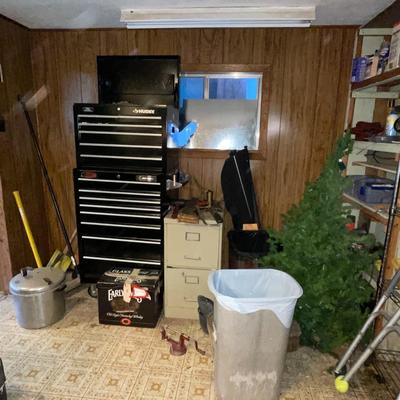 Sale Photo Thumbnail #409: Christmas decor, Presto Pressure cooker, Various Wood and metal shelving units, and much much more. The tool chest you see in the picture DOES NOT go with the lot only the contents. You MUST take everything in the shed, we do not have a dumpster on site. 