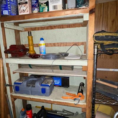 Sale Photo Thumbnail #396: Christmas decor, Presto Pressure cooker, Various Wood and metal shelving units, and much much more. The tool chest you see in the picture DOES NOT go with the lot only the contents. You MUST take everything in the shed, we do not have a dumpster on site. 