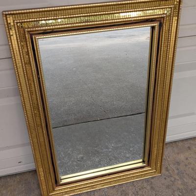 Mirror in gold mosaic frame