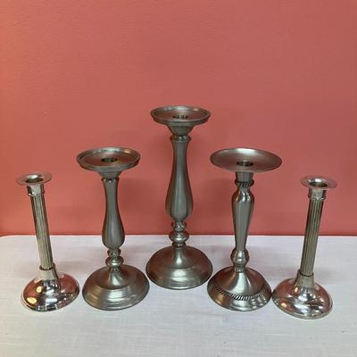 Sale Photo Thumbnail #405: Grouping of 5 pewter-like/silver metal candlesticks