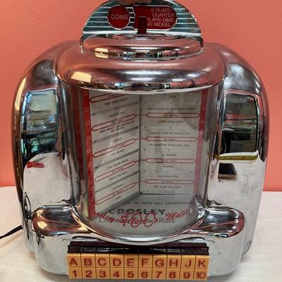 Sale Photo Thumbnail #434: Cute (and working!) jukebox looking radio. Plugs into outlet.