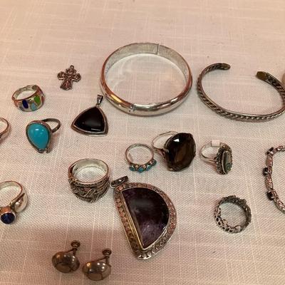 Sale Photo Thumbnail #472: 28 pieces including bracelets, rings, pendants and earrings....all stamped with 925 or sterling indicator