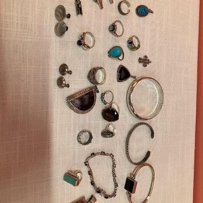 Sale Photo Thumbnail #470: 28 pieces including bracelets, rings, pendants and earrings....all stamped with 925 or sterling indicator