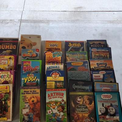 Sale Photo Thumbnail #149: Huge VHS and DVD Kids movies and cartoons.
Will receive all movies pictured
Movies such as Barney, Rugrats, 100 Dalmatians and Jungle Book