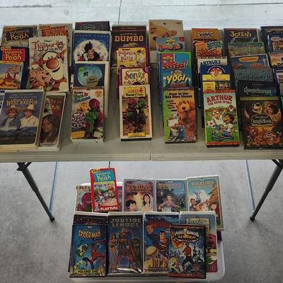 Sale Photo Thumbnail #147: Huge VHS and DVD Kids movies and cartoons.
Will receive all movies pictured
Movies such as Barney, Rugrats, 100 Dalmatians and Jungle Book